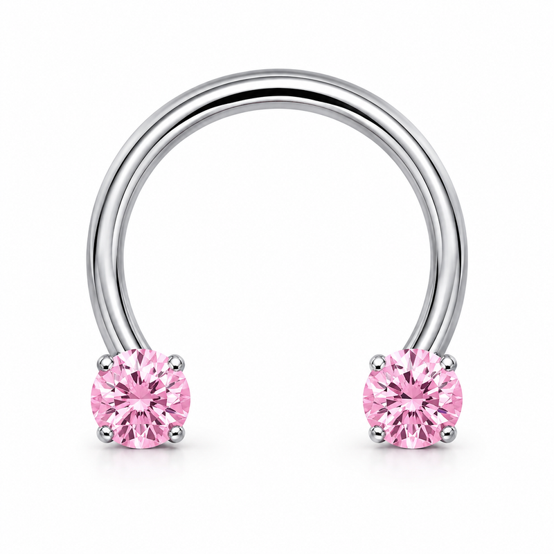 Fer a cheval septum argente 2 zircons roses griffes - fond blanc
