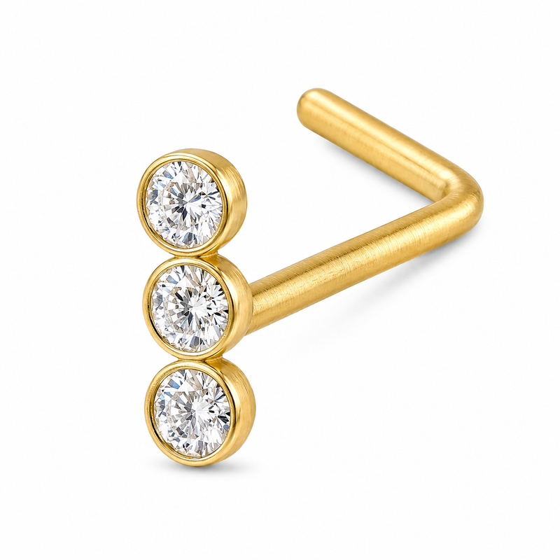 Clou en L dore triple zircon rond bezel empiles — miniature fond blanc