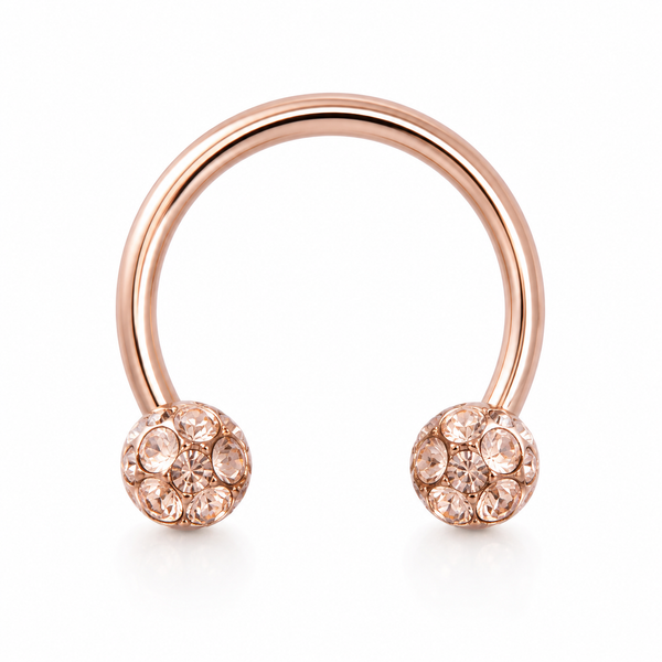 Fer a cheval or rose 2 boules cristal rose irise — miniature fond blanc