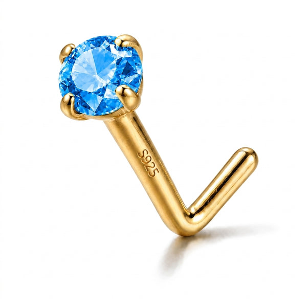 Clou en L argent S925 dore zircon bleu topaze solitaire — fond blanc