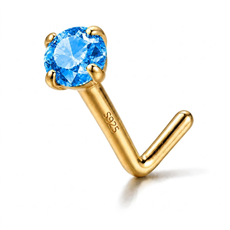 Clou en L argent S925 dore zircon bleu topaze solitaire — fond blanc