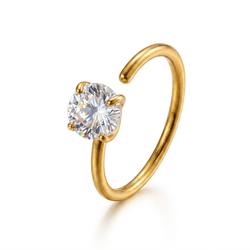 Anneau nez ouvert dore grand zircon rond brillant serti 4 griffes — fond blanc