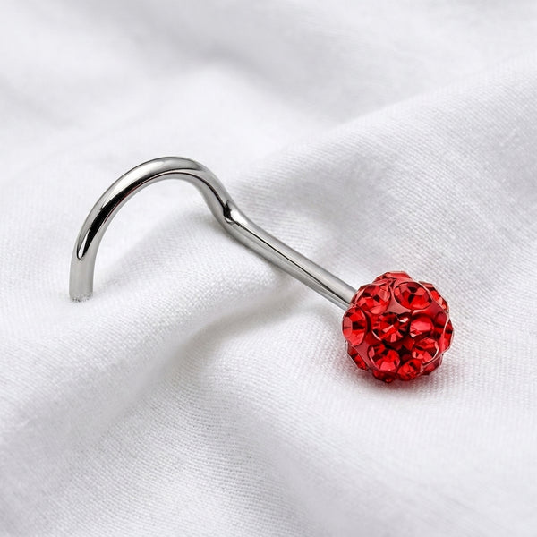 Vis nez argentee boule disco strass rouge — posee sur tissu blanc