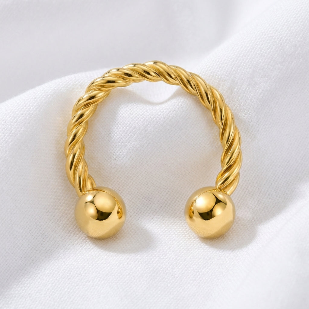 Fer a cheval dore torsade 2 boules — pose tissu blanc