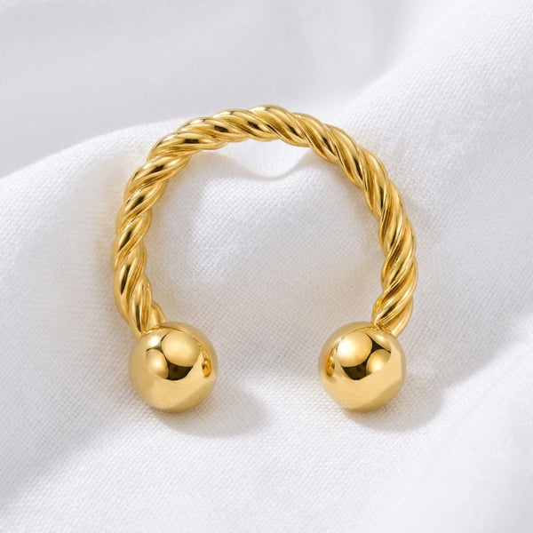Fer a cheval dore torsade 2 boules — pose tissu blanc