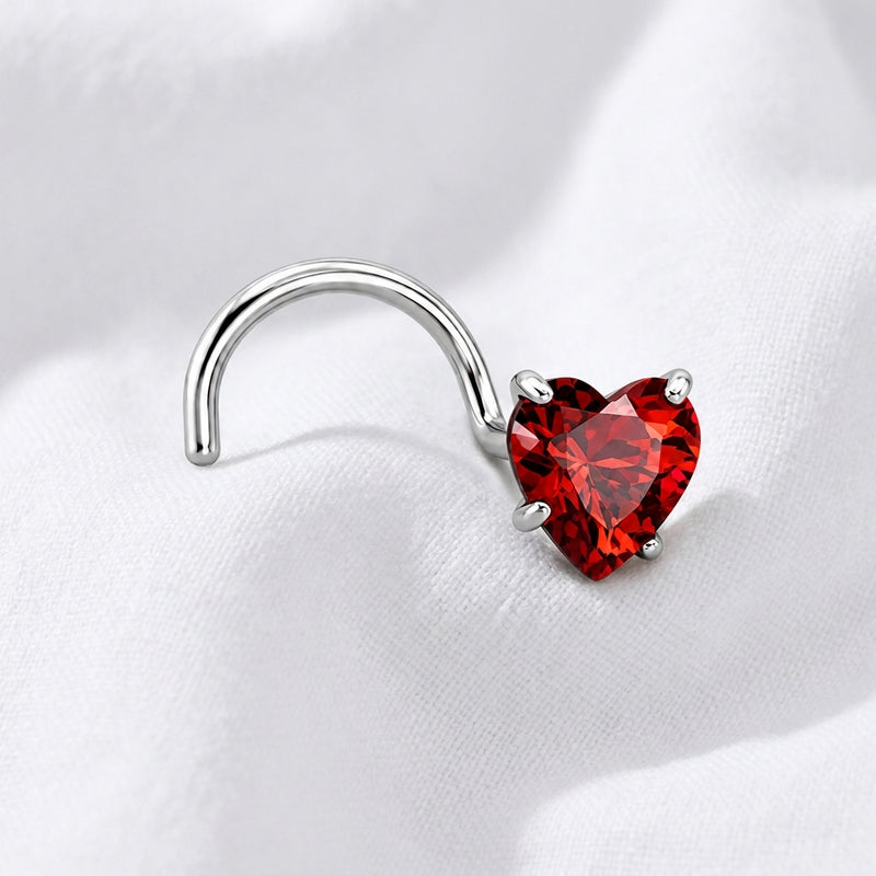 Vis nez argentee zircon coeur rouge — posee sur tissu blanc