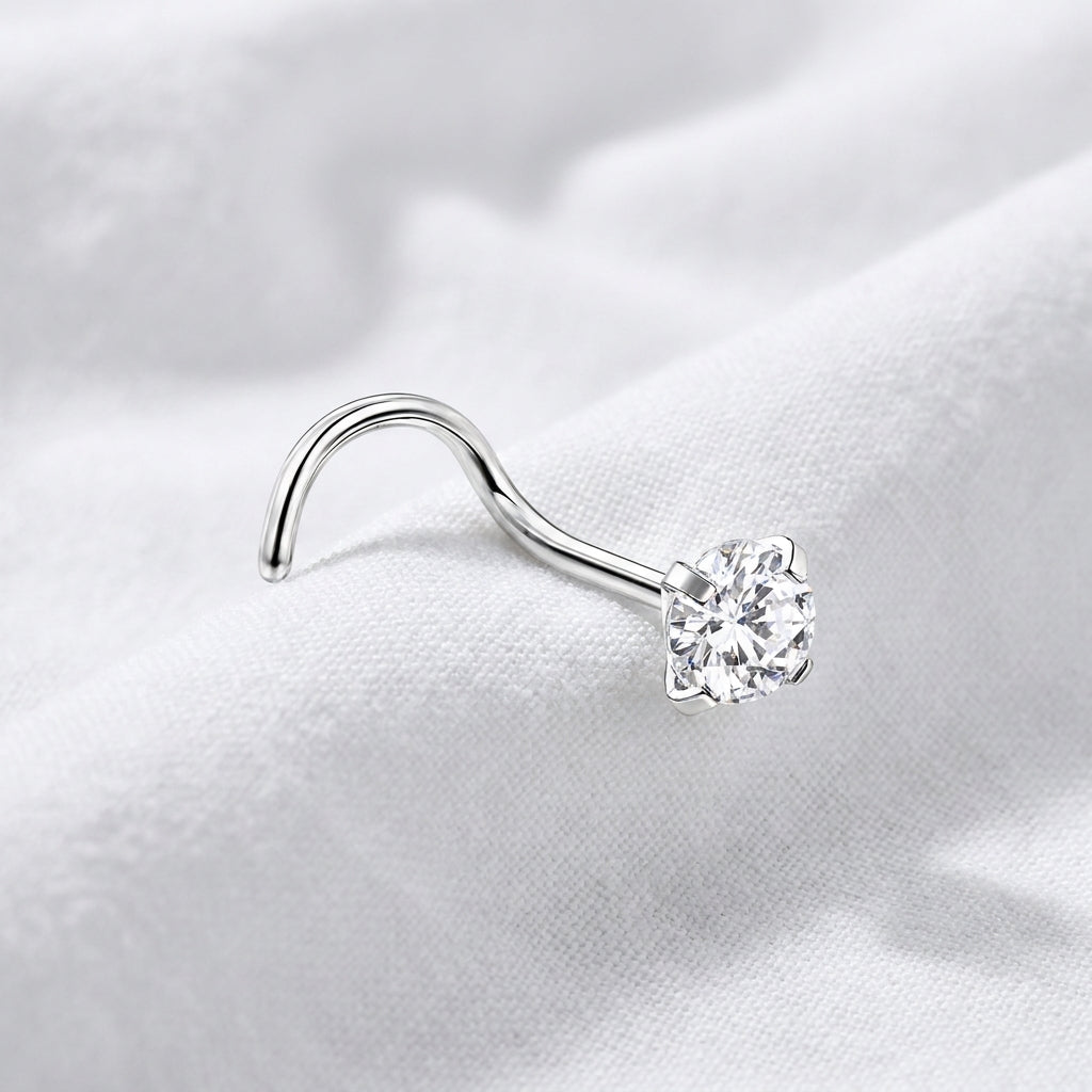 Vis nez argentee zircon solitaire blanc — pose tissu blanc