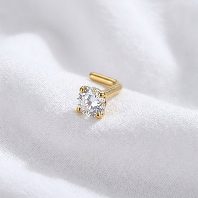 Clou en L argent S925 dore zircon blanc solitaire — pose tissu blanc