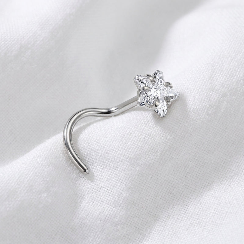 Vis argentee etoile 4 branches zircons marquise — posee tissu blanc